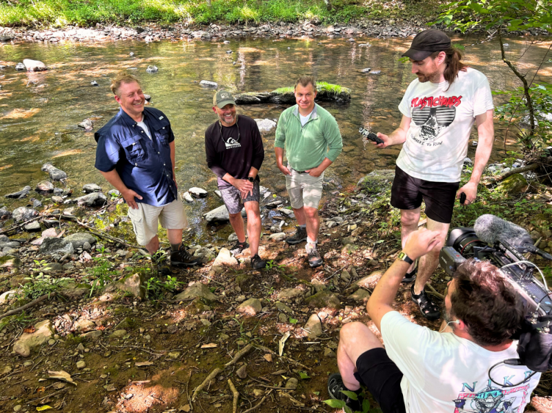 William Hopkins (at center), professor of fish and wildlife conservation, was tapped by Martin Kratt (at far left) and Chris Kratt of the "Wild Kratts" television show to share about the elusive hellbender salamander for the Nov. 4 episode appearing on PBS Blue Ridge at 7 a.m. ET. Photo courtesy of Holly Funkhouser.