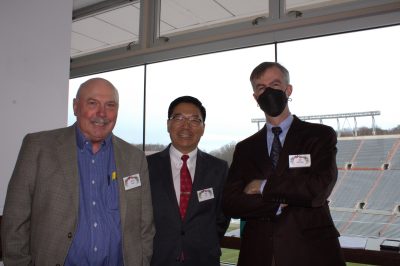 Dennis Dean, at left, Dan Sui, center, and Rob McCarley at the Fralin Life Sciences Institute holiday award luncheon.