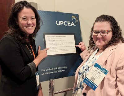 From left, Sarah Gouger and Leslie Thorton-O'Brien, stand in front of a presentation board. 