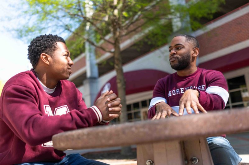 Joshua Pulliam talks to student at Morehouse College